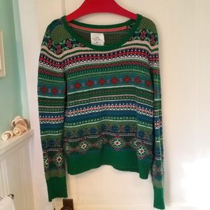 A green Fair Isle pullover sweater